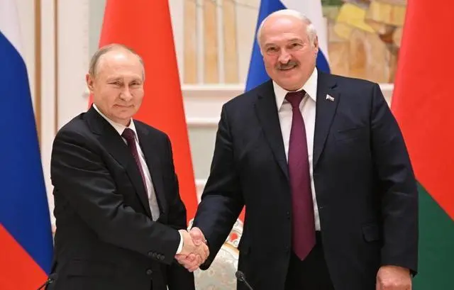 △普京（左）与卢卡申科（右）