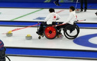 中国轮椅冰壶队在米兰冬残奥会初赛中获胜丨速递