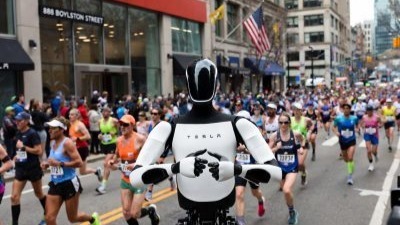 Optimus：特斯拉人形机器人亮相波士顿马拉松激励跑者
